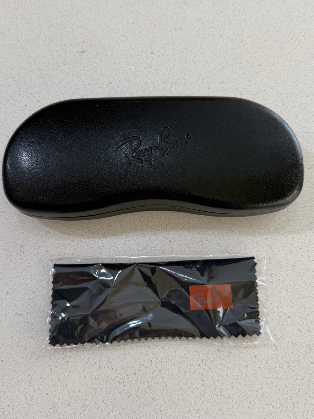 Ray-Ban Black Logo Hardshell Sunglasses Case with cleaning cloth.